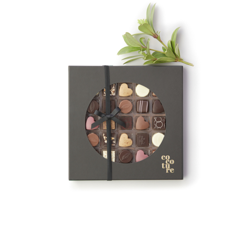Billede af Fyldte chokolader og konfektstykker i sort Cocoture æske
